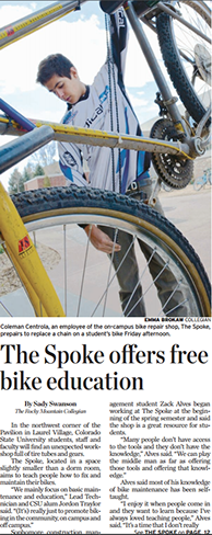 Screenshot of the Collegian article about The Spoke offer free bike education with a photo of a bike mechanic fixing a bike.